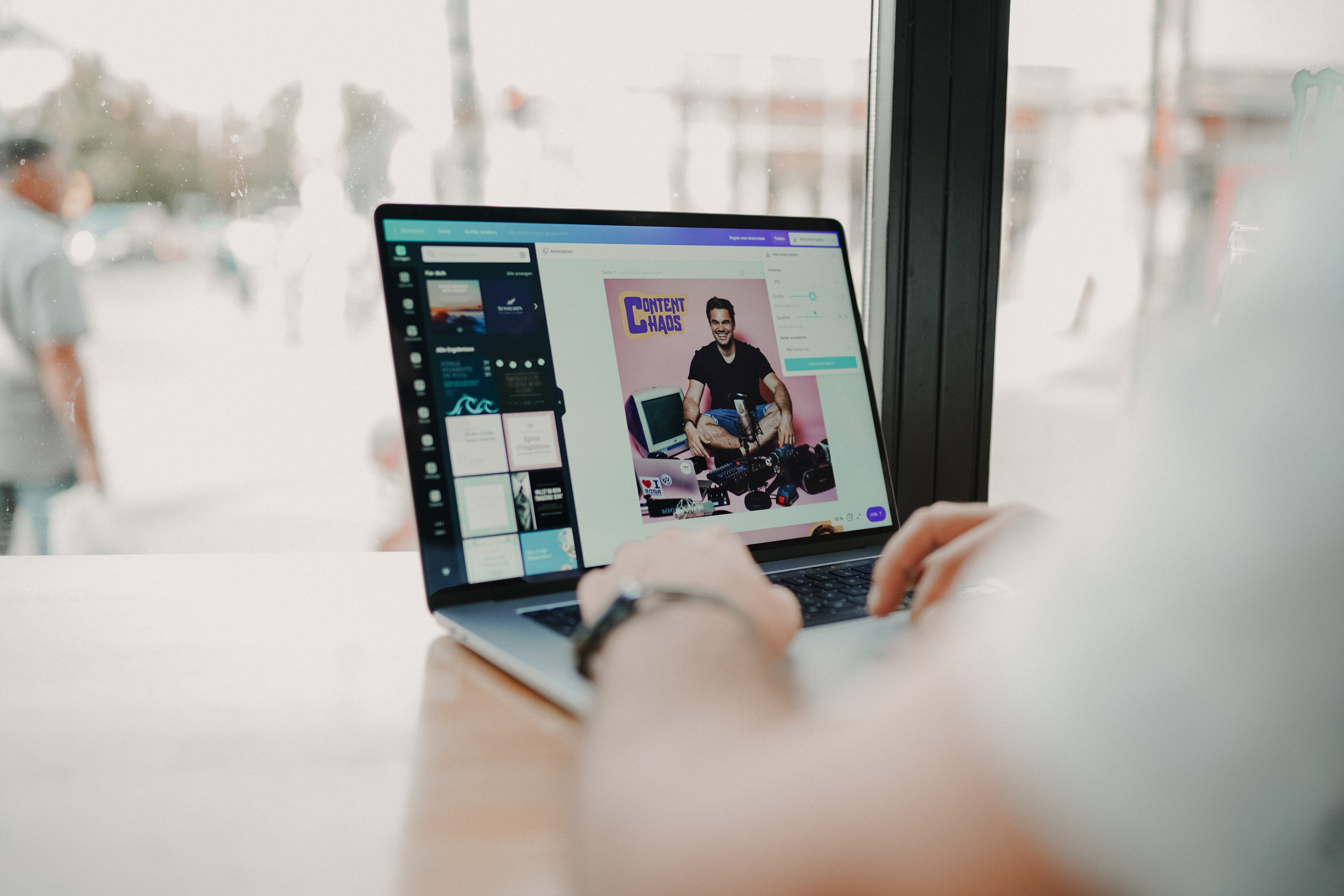 New-hire learning how to use Canva (part of their company's digital tool stack) on company-issued laptop